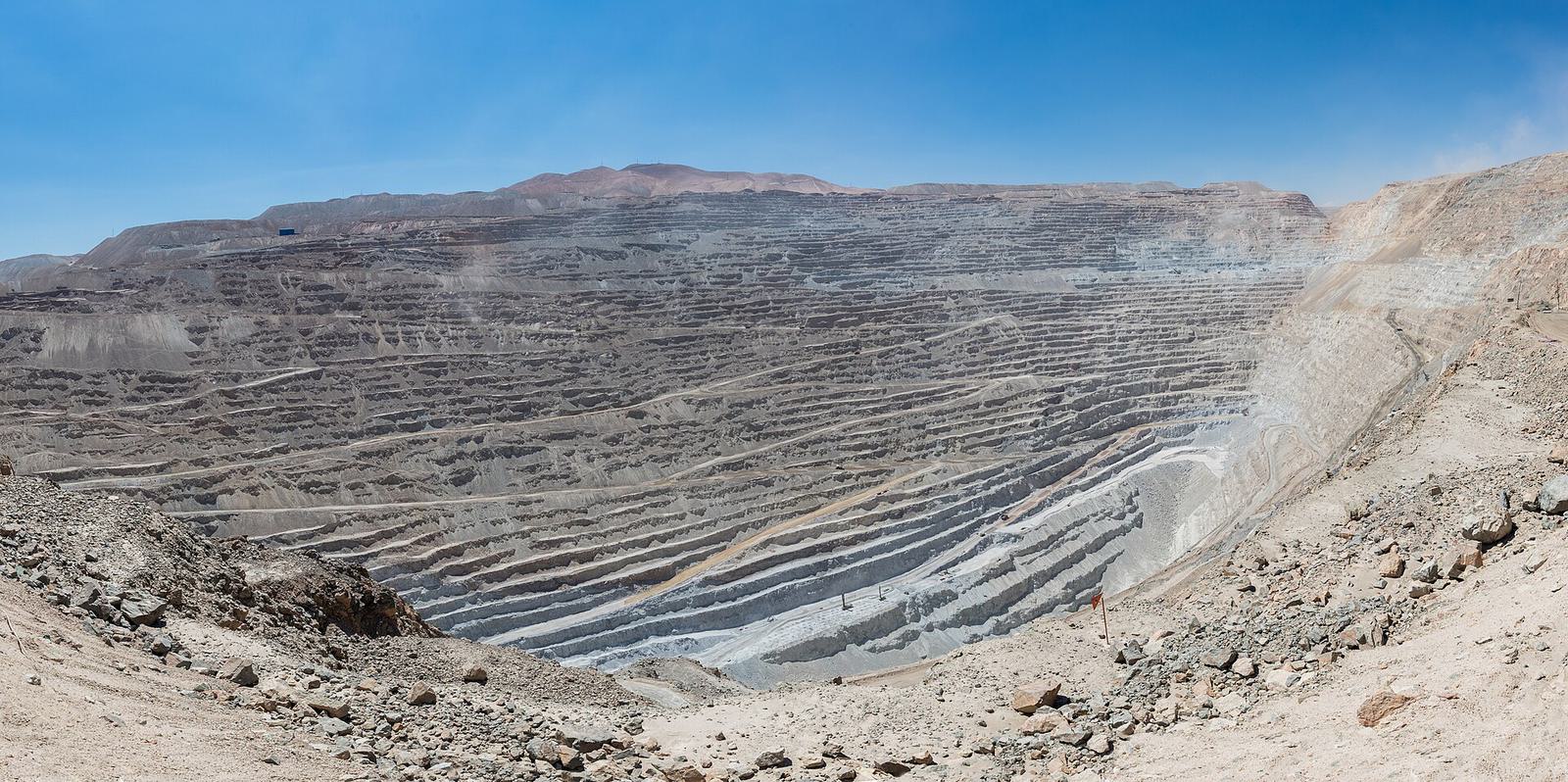 Panorama of the Chuquicamata pit, a vast terraced hole in the desert